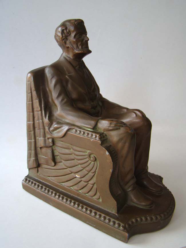 A lovely pair of bronze patinated antique bookends by Nuart circa 1924 depicting 'Lincoln in the chair.' — image 2